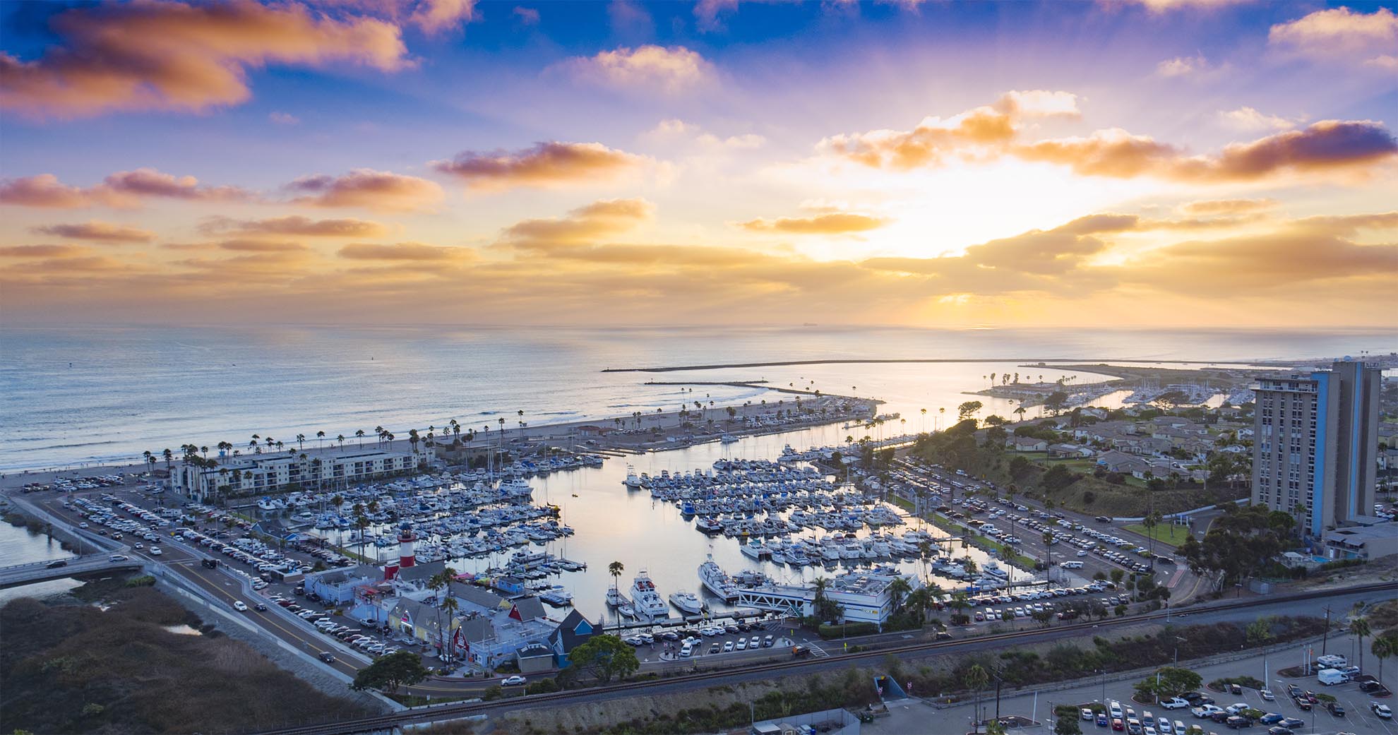 Drone photograph of Oceanside Harbor at sunset