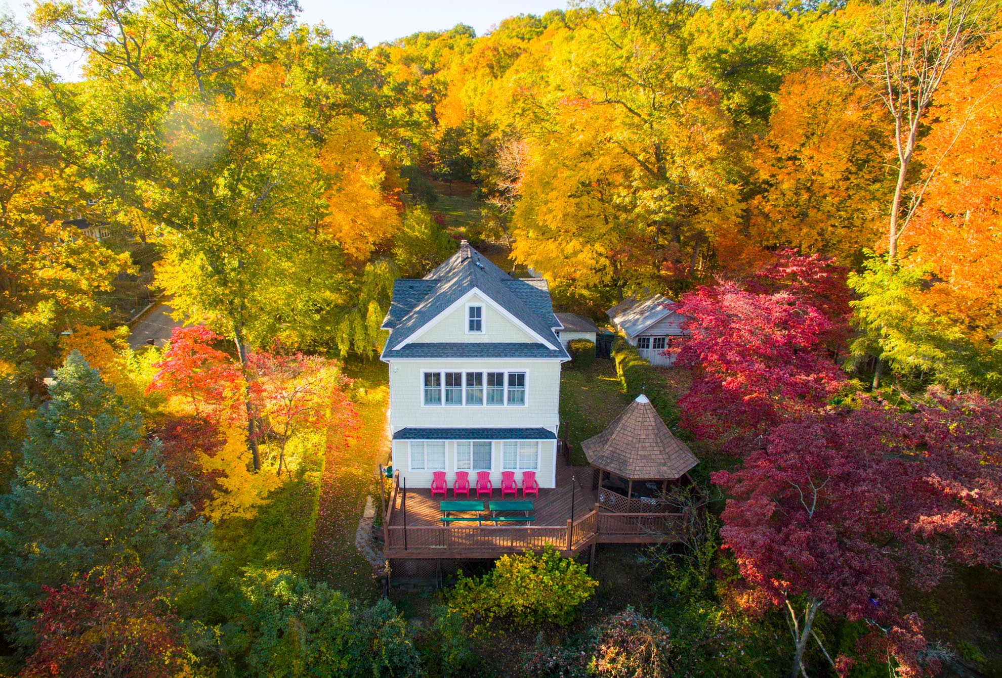 Drone photograph of Lake Home with Autumn Leaves