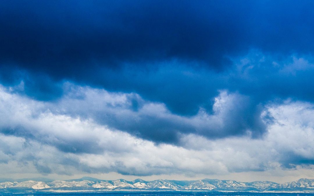 Photograph of Rocky Mountains during a storm taken with a Drone