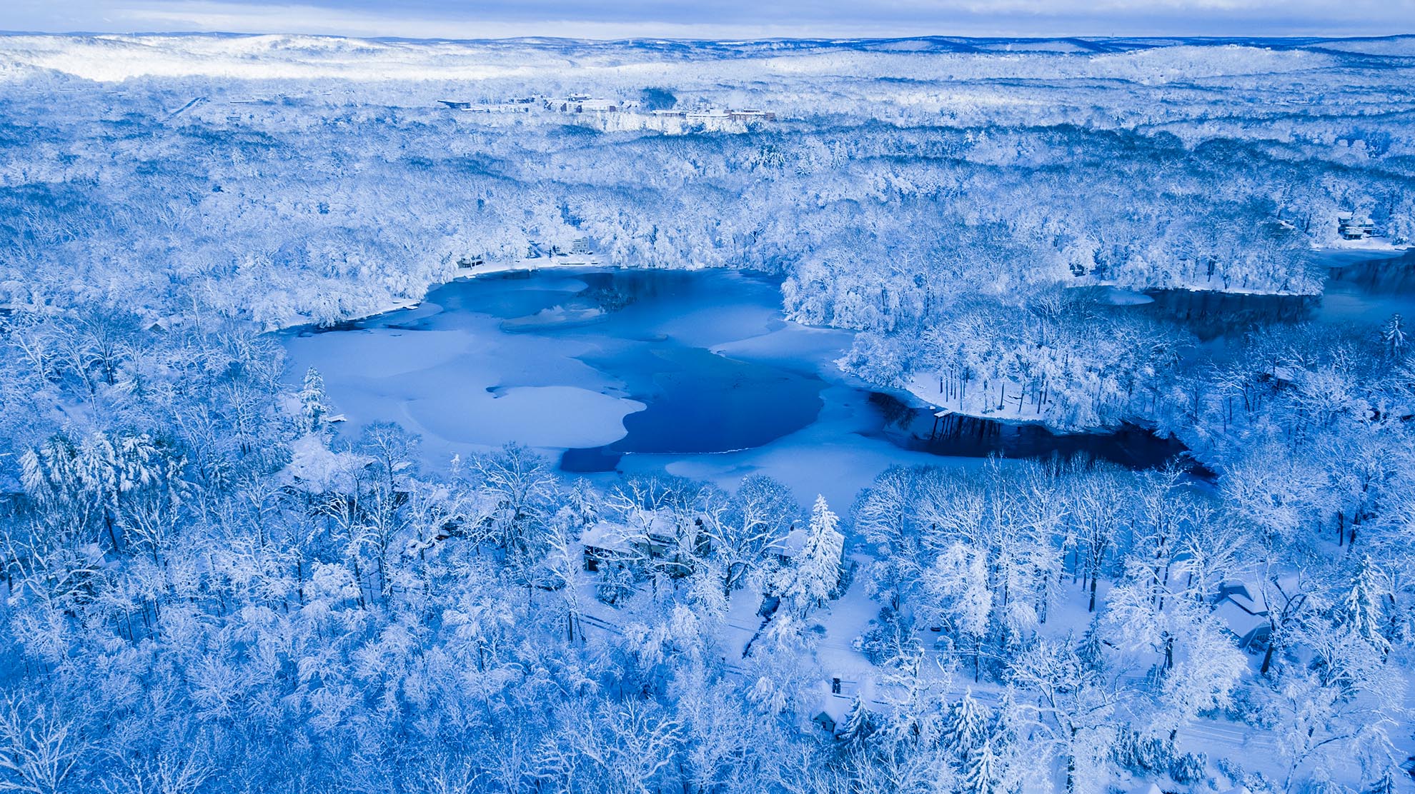 Photograph of Sunset Lake Mountain Lakes NJ after snow storm from a drone