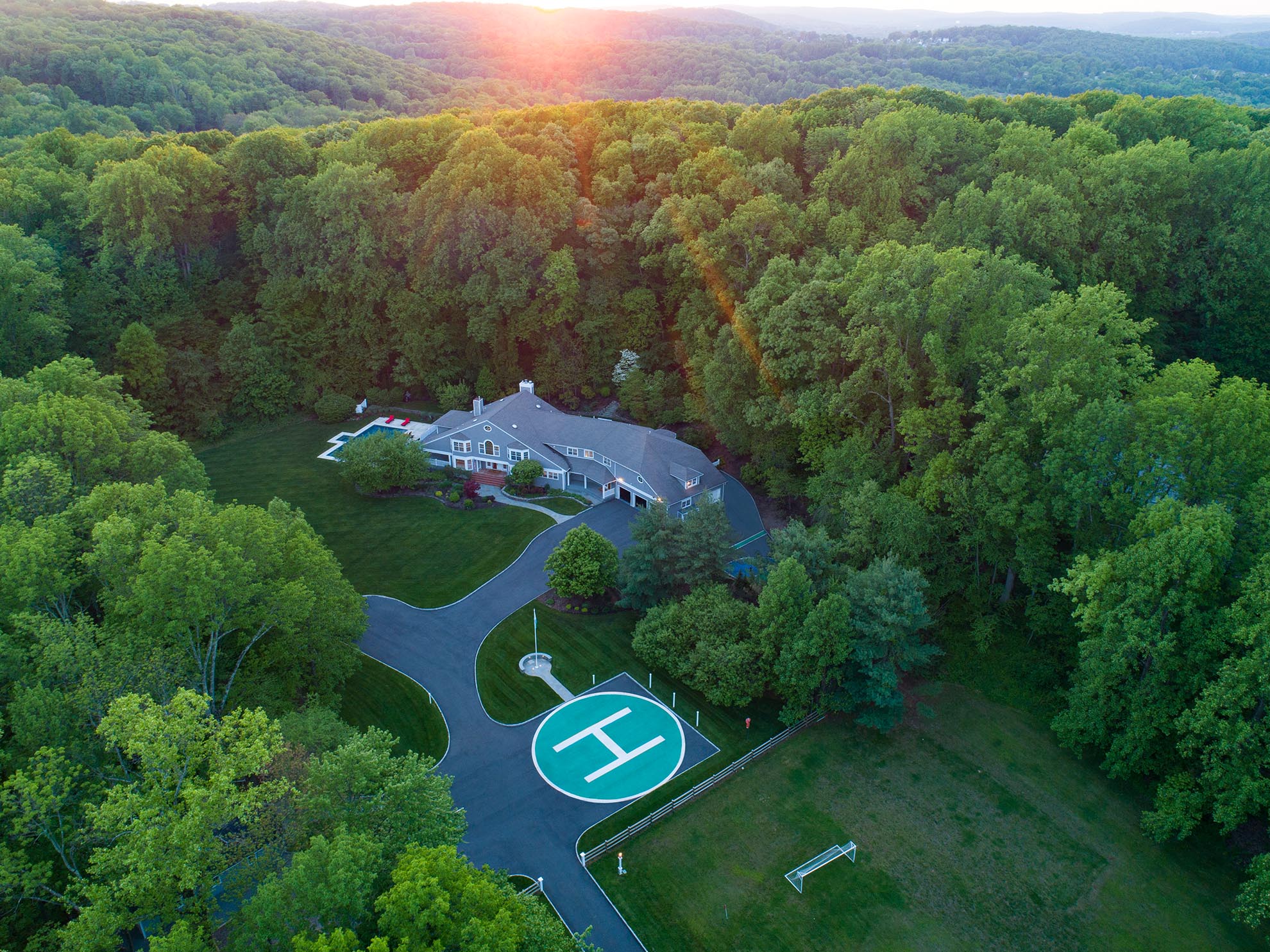 Drone photograph of Home in Randolph NJ with a Helipad