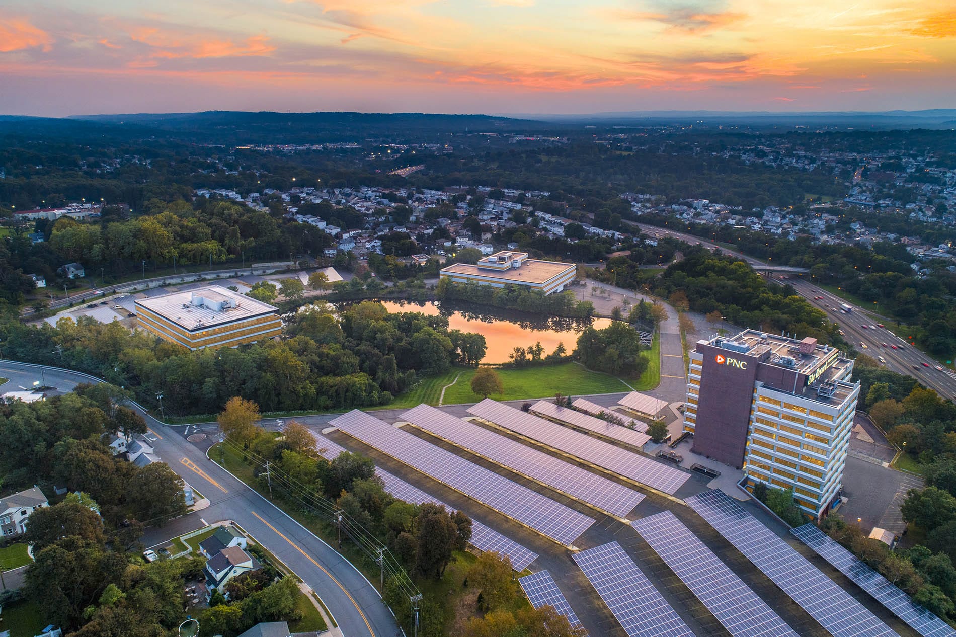 Drone Photograph taken of Commercial Buildings with Solar Panel Parking Lot in New Jersey