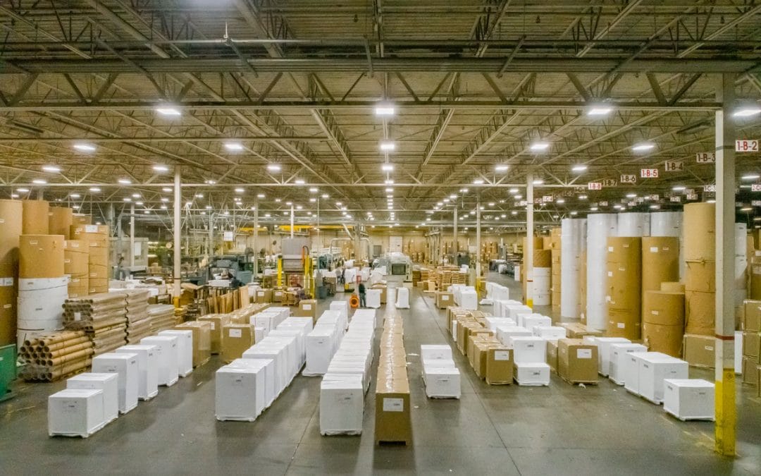 Drone Photograph of the inside of the Roosevelt Paper Company showing neatly stacked bundles of Paper ready to ship