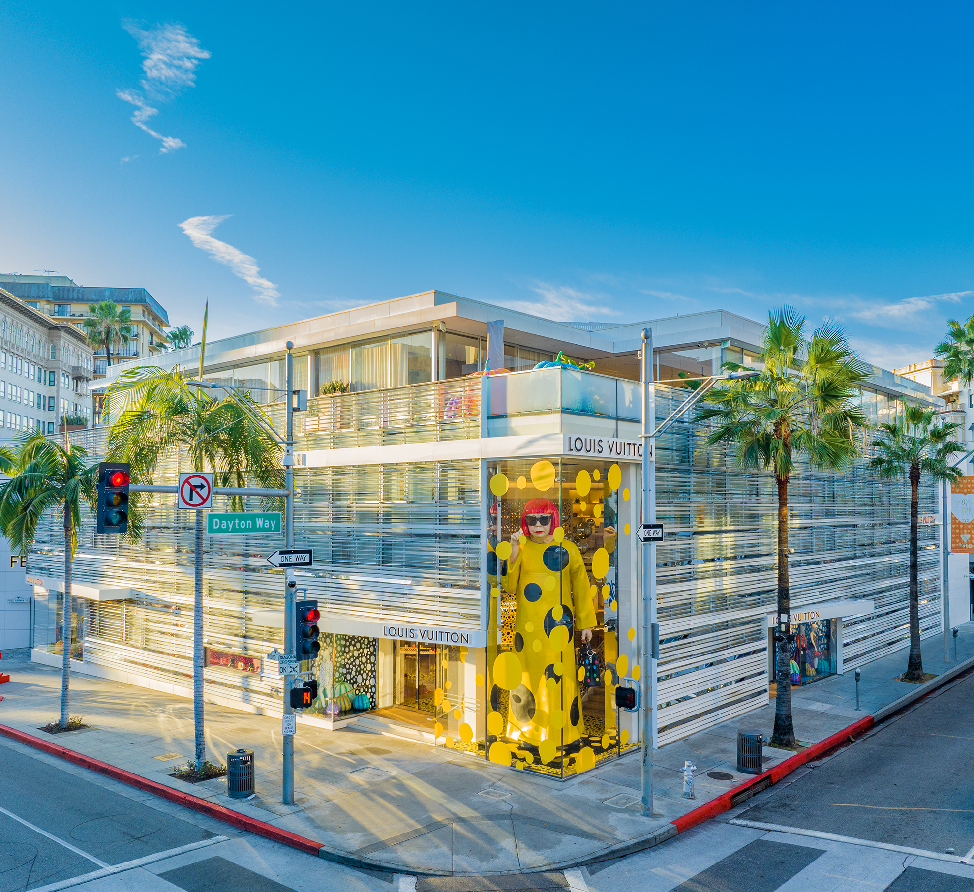 Drone Photography of front of store with Statue of Yayo Ikusama in window at Louis Vuitton store on Rodeo Drive Beverly Hills California