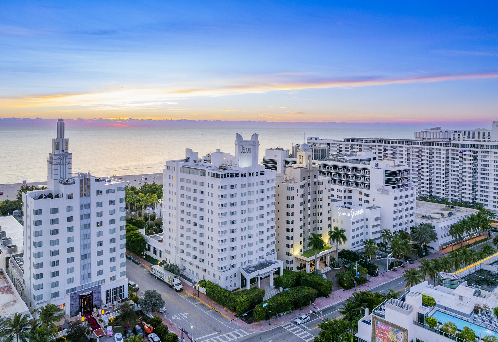 Drone Photograph of Miami Beach at sunrise showing the white hotels