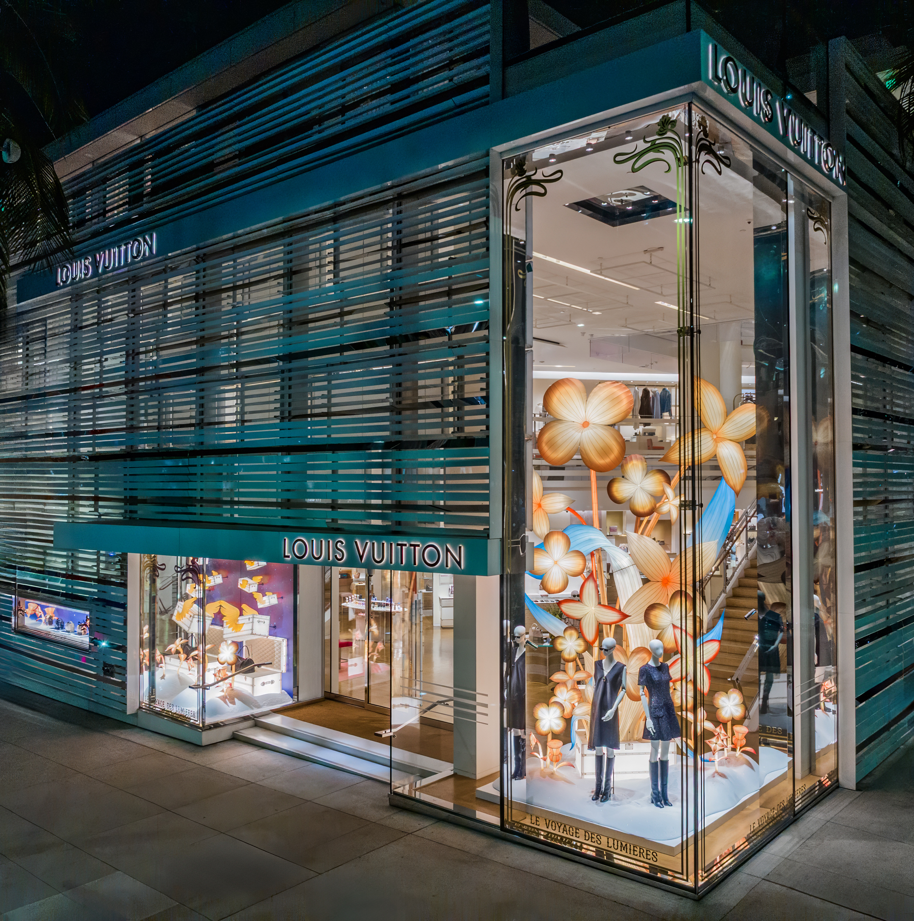 Drone photograph of Louis Vuitton Women's Store at night on Rodeo Drive Beverly Hills California