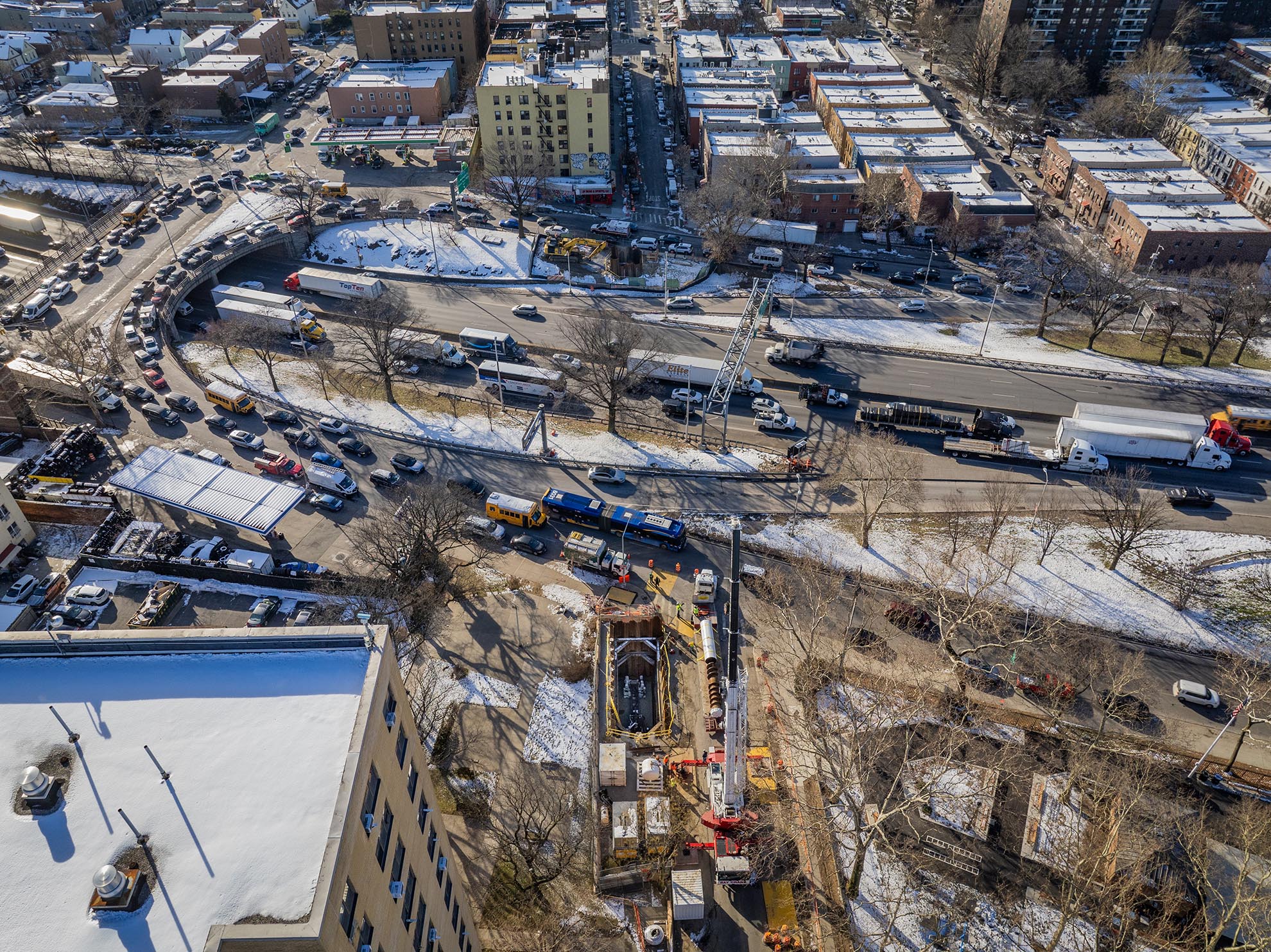 Drone photo of Crane installing Drilling Machine at a Bronx construction site