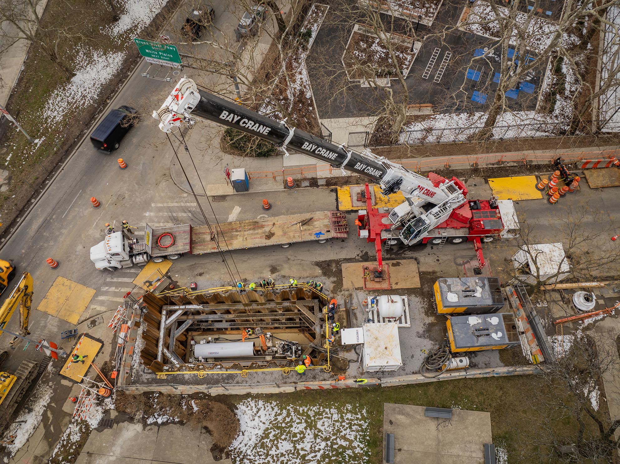 Drone photo of Crane installing Drilling Machine at a Bronx construction site