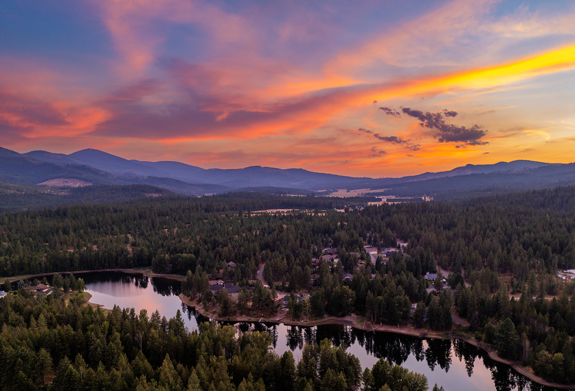 Drone photograph of sunset of Lake San Souci Blanchard, Idaho